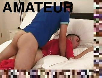Sexy guys in footie kit fucking on the bed