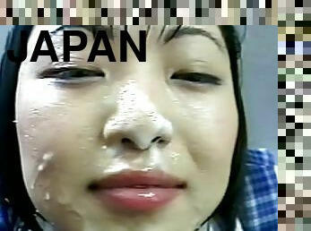 Young japanese gets covered in jizz