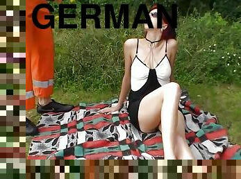 A slim German redhead gets warm cum all over her amazing boobs 