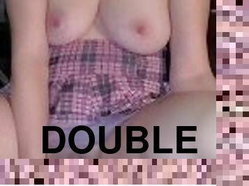 Big tittied girl in short skirt takes huge double-sided dildo