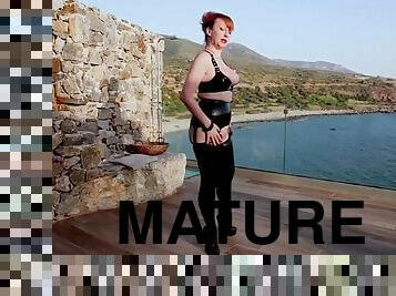 Mature british redhead masturbating on the balcony
