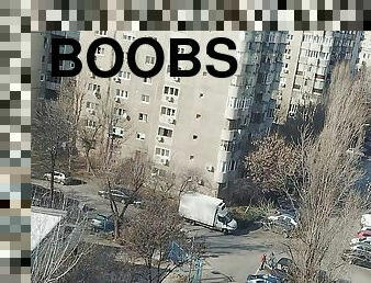 Horny big boobs teen in nylon dance in front of apartment window
