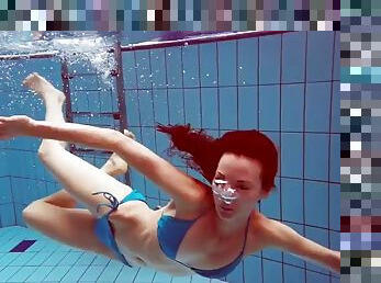 Hot teen Martina swims naked underwater