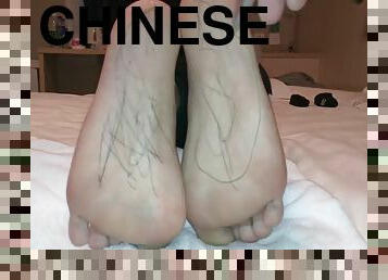 Chinese feet tickle