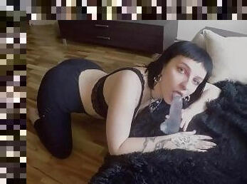 goth girl horomi shows off her sucking skills on a dildo