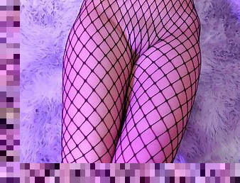 Asian in fishnet gives a footjob and gets cum all over her pussy