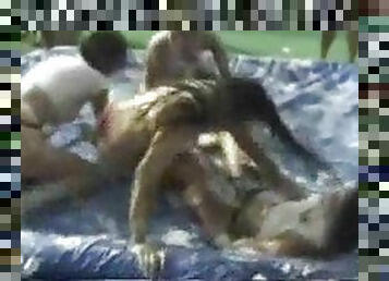 Girls oil wrestling at spring break