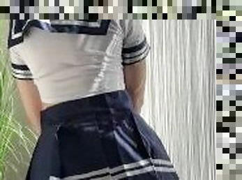 Cute Schoolgirl dances and flashes boobs