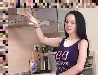 Hottie with natural tits masturbates in the kitchen