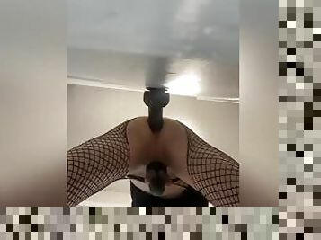 Twink femboy fucking a wall with a huge dildo.