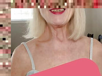 Older stepmom Danielle Dubonnet shows her tits to a fan on camera