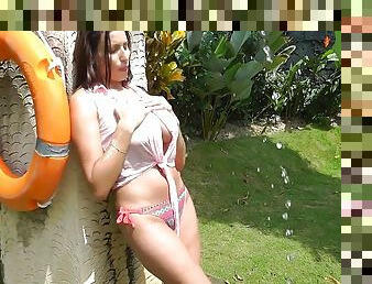Brunette with big natural tits fucked in a theme park