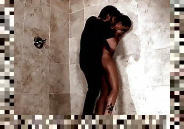 Tight tanned babe doing blowjob in the shower