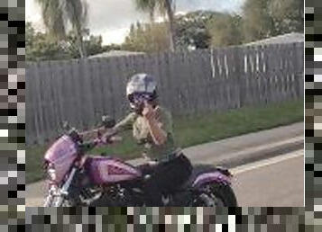 Bonnie public flashing while riding motorcycle