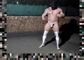 Thonged muscle man on a public street