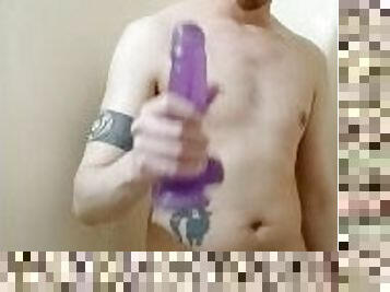 Taking a big dildo in the shower