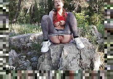 Nerdy teen girl shows boobs and masturbates in a park
