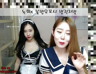 Korean teens camgirls in uniforms have fun
