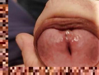 Rock and cock close up with cum