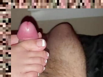 Girl gives me a foot job while chilling