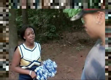 Black cheerleader gives great blowjob in the woods