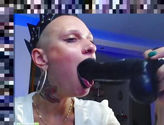 Amateur alt babe deepthroats huge dildo on webcam