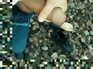 Twink barefoot jerking in the park - cumshot on shoe and foot