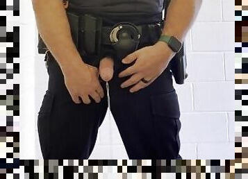 Police Officer pissing in public restroom