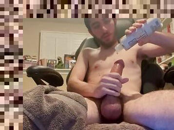 Young man fresh outta the shower lubes up his cock and strokes for you