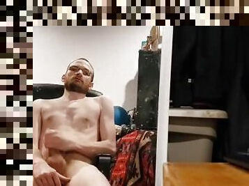 Skinny guy with huge cock cums sitting down