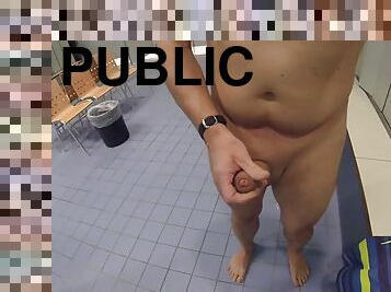 Very boldly I jerked off my big uncut cock in a public locker room. I wanted to cum, but someone came