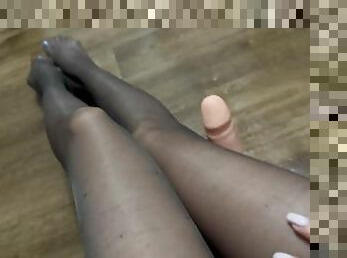 footjob in stockings with a big dildo and showing feet