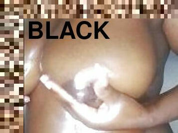 Black ebony with auto spray of breast milk.