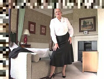 Beautiful matured granny in nylon stockings stripteasing seductively indoors